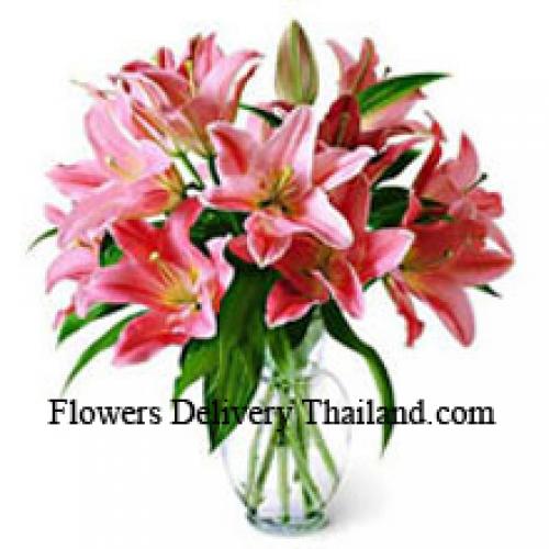 Cute Lilies in Glass Vase